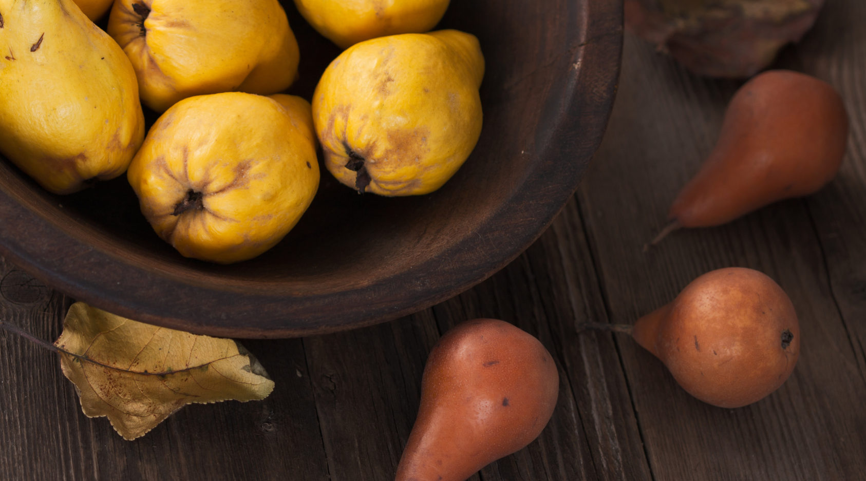 Stillleben mit Quitten und Birne